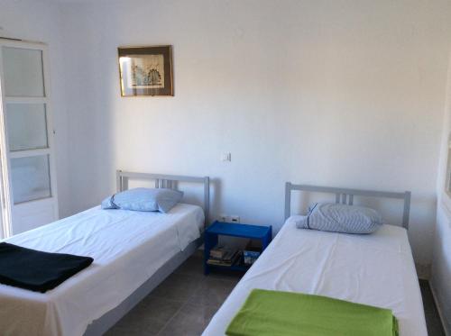 Postel nebo postele na pokoji v ubytování SIFNOS - Vathy