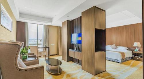 Katil atau katil-katil dalam bilik di Santavan Hotel Shenzhen Guangming