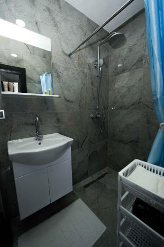 Koupelna v ubytování Apartmani M&DŽ Bihać