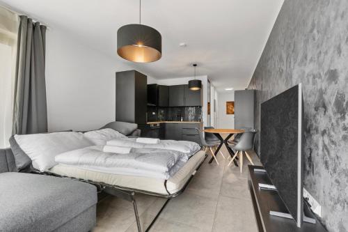 En eller flere senge i et værelse på LAM Felidae - AC - Balcony