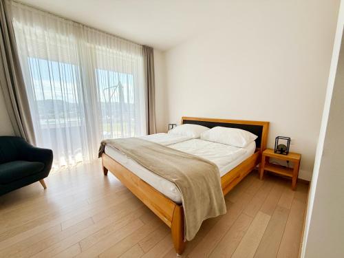 Postel nebo postele na pokoji v ubytování Apartment am Weinberg