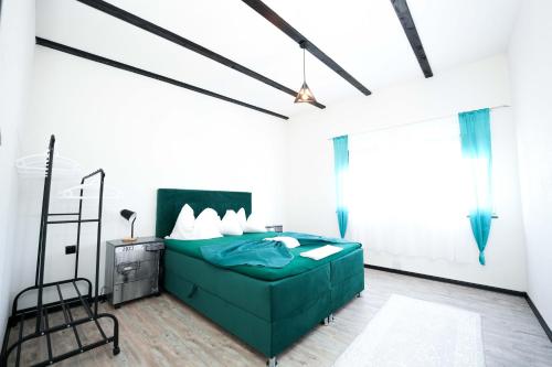 Postel nebo postele na pokoji v ubytování Apartmani M&DŽ Bihać