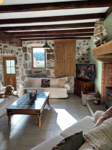 Posezení v ubytování Beautiful house with pool and spa in Dordogne 3 bedrooms