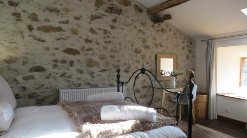 Postel nebo postele na pokoji v ubytování Beautiful house with pool and spa in Dordogne 3 bedrooms