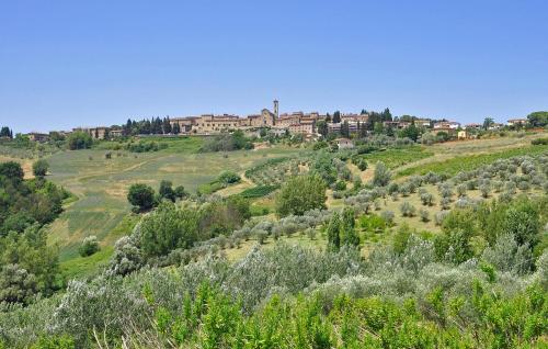 a town on top of a hill with trees at Amazing Home In Barberino Tavarnelle in Barberino di Val dʼElsa