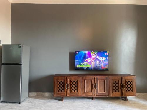 TV a/nebo společenská místnost v ubytování Bahai nest