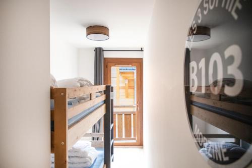 Llit o llits en una habitació de Oly Vacances Morzine
