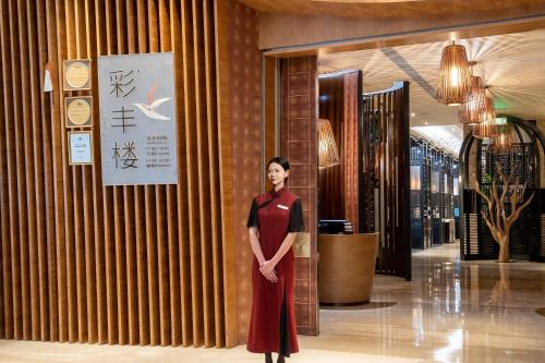 Členové personálu v ubytování Crowne Plaza Fuzhou Riverside by IHG