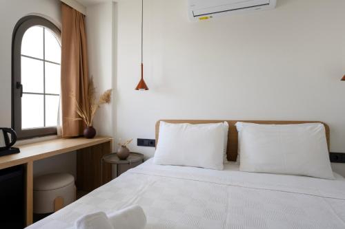 Postel nebo postele na pokoji v ubytování Casa Dalida Boutique Hotel