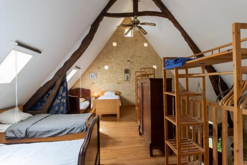 Centre Equestre Du Passe Tempsにあるベッド