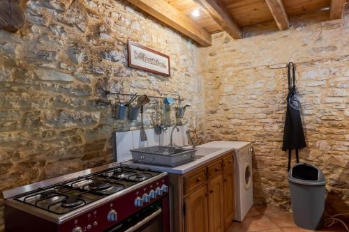 Centre Equestre Du Passe Tempsにあるキッチンまたは簡易キッチン