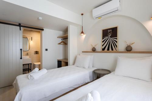 Postel nebo postele na pokoji v ubytování Casa Dalida Boutique Hotel