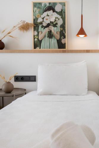 Postel nebo postele na pokoji v ubytování Casa Dalida Boutique Hotel
