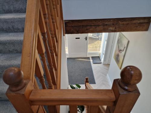 an overhead view of a stairway with a room at Southbarn - Spectacular Country Home in Winestead