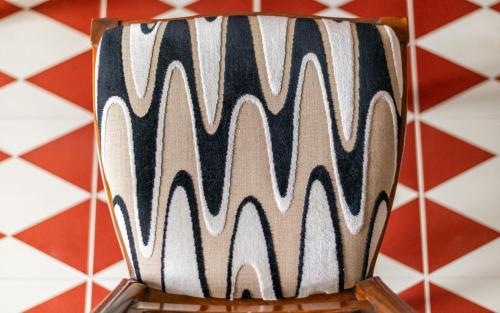 a chair with a zebra pattern on it at L'Olivazzo Apartment in Chiusi