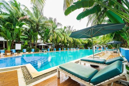 Bazén v ubytování Phu Van Resort & Spa Phu Quoc nebo v jeho okolí