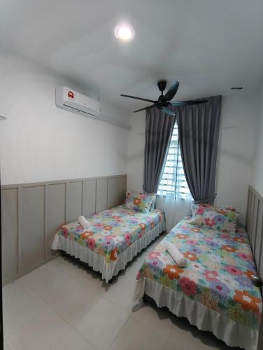 Кровать или кровати в номере Stella Homestay