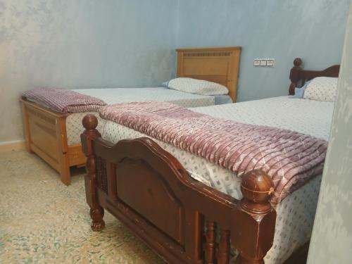 Кровать или кровати в номере Appartement meublé centre ville 30 m hôpital Med V