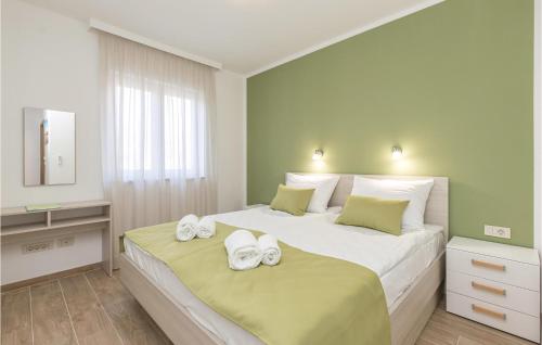 Ένα ή περισσότερα κρεβάτια σε δωμάτιο στο Stunning Apartment In Kostrena