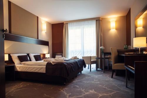 Postel nebo postele na pokoji v ubytování Hotel Era