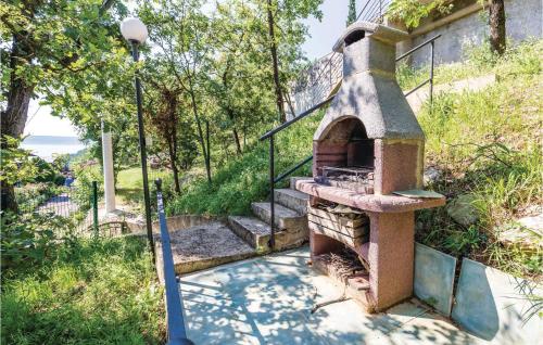 Vonkajšia záhrada v ubytovaní Cozy Apartment In Moscenicka Draga