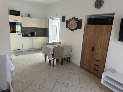 Kuchyň nebo kuchyňský kout v ubytování Apartments Vinea