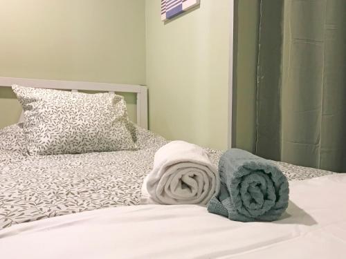 Ένα ή περισσότερα κρεβάτια σε δωμάτιο στο Urbany Hostel Barcelona