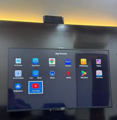 a television screen with different apps on it at Best Day Homestay ! in Kangar
