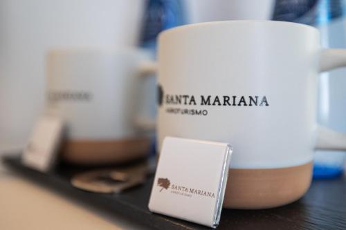 a coffee cup sitting on a shelf with other cups at Agroturismo Santa Mariana in Alaior