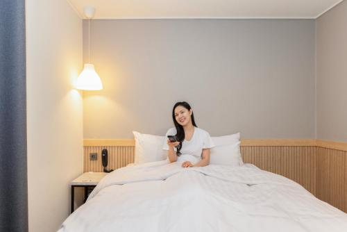 Una cama o camas en una habitación de Hotel Wol