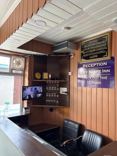 Ο χώρος του lounge ή του μπαρ στο City Scape Inn