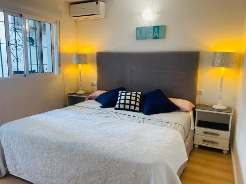 Postel nebo postele na pokoji v ubytování Pueblo Los Olivos, Riviera del Sol