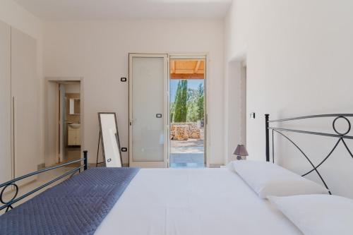 Postel nebo postele na pokoji v ubytování Villa Amelia by BarbarHouse