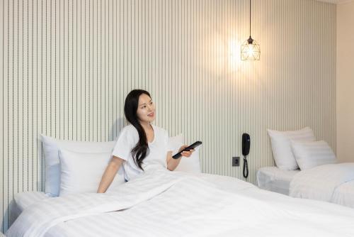 Una cama o camas en una habitación de Hotel Wol