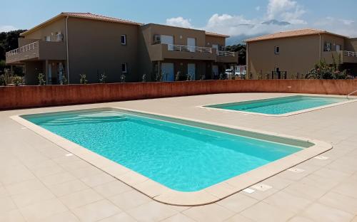 Πισίνα στο ή κοντά στο Villa de luxe en bord de mer Résidence Torra Mare a Prunete