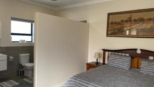 Koupelna v ubytování Fish & Go -Lovely cottage in gated Estate on river