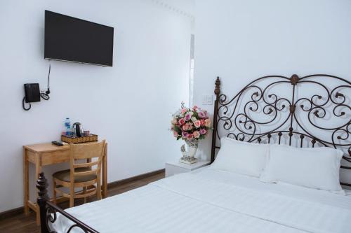 Ένα ή περισσότερα κρεβάτια σε δωμάτιο στο Bighotel Can Tho