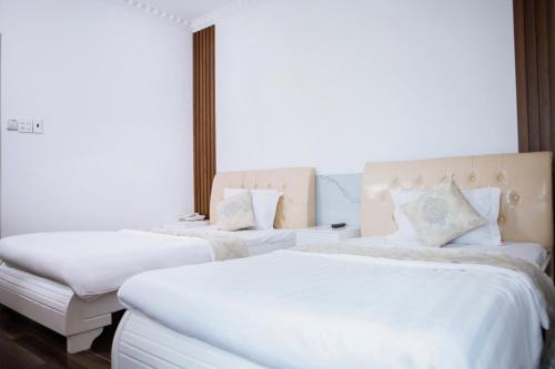 Ένα ή περισσότερα κρεβάτια σε δωμάτιο στο Bighotel Can Tho