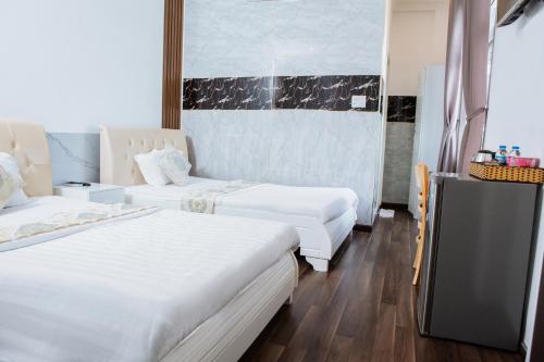 Ένα ή περισσότερα κρεβάτια σε δωμάτιο στο Bighotel Can Tho