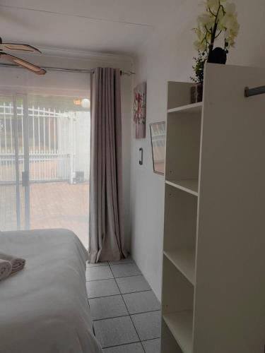 Katil atau katil-katil dalam bilik di Cosy Studio Apartment