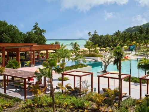 a view of the pool at the resort at Canopy By Hilton Seychelles Resort in Anse a La Mouche