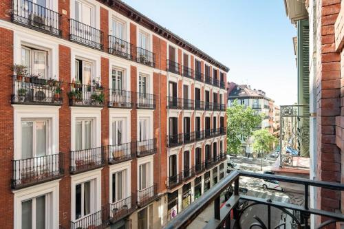 Exclusive apartment in San Bernardo by Cómodo Madrid