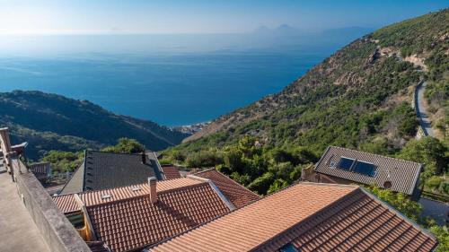 a view of the ocean from a mountain at Casa del Mandarino Gioiosa Marea in Gioiosa Marea