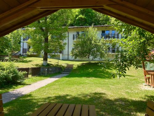 a view of a building from a yard at Casa Flori de Sare in Slănic