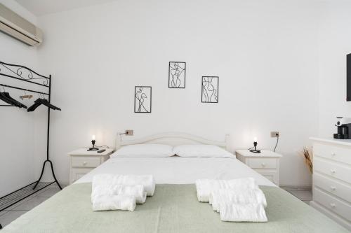 Ένα ή περισσότερα κρεβάτια σε δωμάτιο στο Residenza mediterranea golfo orosei