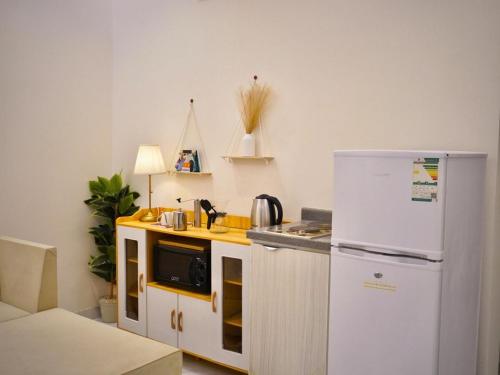 Η κουζίνα ή μικρή κουζίνα στο مسكن ترف 1