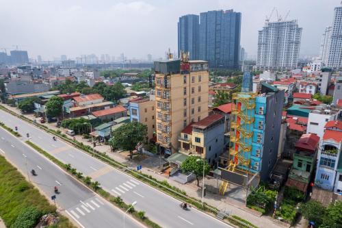 an aerial view of a city with buildings and a street at TITANIC HOTEL in Hanoi