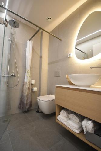 Koupelna v ubytování Oceanis Hotel Tyros