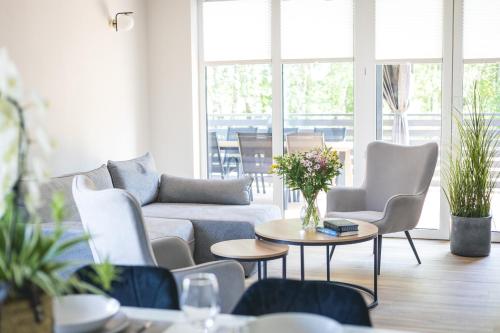 Posezení v ubytování BURSZTYN - BERNSTEIN APARTMENTS
