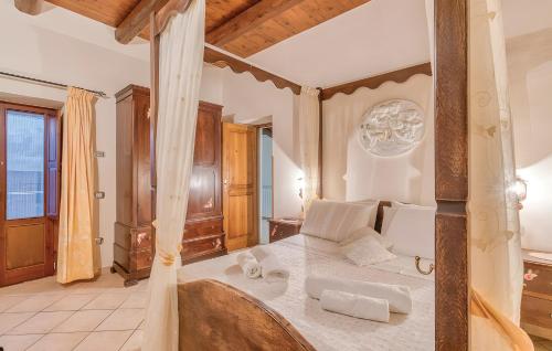 Postel nebo postele na pokoji v ubytování Agriturismo I Fornari